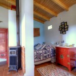 Casa pequena - Quarto e salamandra
